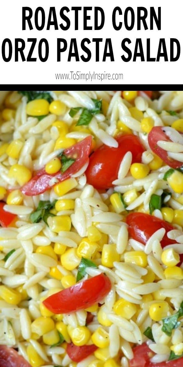 the pasta salad has corn and tomatoes on it