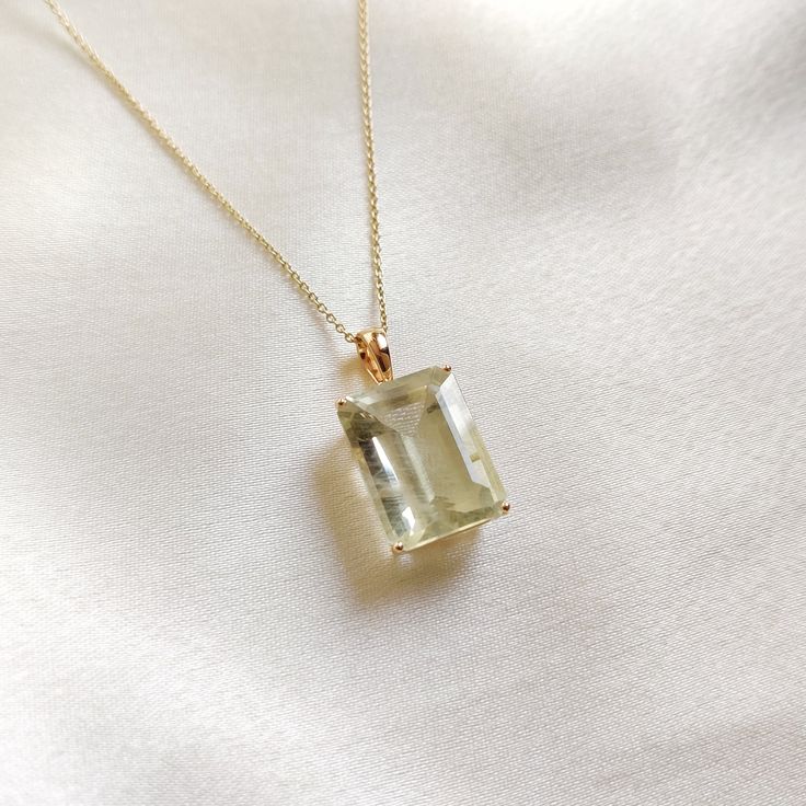 This stunning pendant is set in 14K Solid Yellow Gold with Green Natural Aquamarine with utmost precision. It is an unique gemstone pendant for nearly every occasion and is completely hassle-free jewelry. ITEM DETAILS * Gem: Aquamarine * Gem Size: 12X16mm * Gem Shape: Octagon * Gem Weight: 10.93 carats * Gold Purity: 14KT  * Gold Weight: 1.17 gram * Total Weight of the Pendant: 3.34 gram The Gold purity is guaranteed and it comes with authentic 14KT gold hallmark. Since my items are handmade, they are absolutely nickel and lead free. CUSTOMIZATION * Gemstone customization is available and it can be substituted with a gem of your choice. Kindly message me for the same. PACKAGING * The Pendant comes with layers of safe and secure wrapping along with Free handmade jewelry box with every purch Elegant Gold Gemstones With Large Stone, Elegant Large Stone Necklace For Anniversary, Luxury Green Amethyst Jewelry As Gift, Elegant Gemstones With Large Stone For Gift, Elegant Large Stone Gemstone For Gift, Luxury High Luster Gemstones For Gift, Classic Green Amethyst Jewelry For Gift, Elegant Green Amethyst Jewelry For Gifts, Elegant Necklace With Large Rectangular Stone Pendant