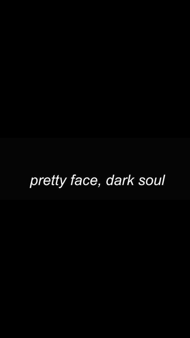 the words pretty face, dark soul are written in white letters on a black background