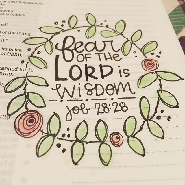 an open bible with hand lettering and flowers on the page that says, beauty of the lord is widow