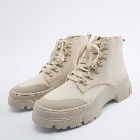 Off White Ankle Canvas Boots Never Worn, Nwt Trendy Beige Lace-up Boots With Round Toe, Casual Lace-up Boots For Spring, Casual Beige Boots For Fall, Casual Khaki Lace-up Boots, Casual Beige Lace-up Boots For Fall, Casual Khaki Leather Desert Boots, Casual Khaki Ankle-high Boots, Beige Lace-up Boots For Fall, Spring Casual Lace-up Ankle Boots