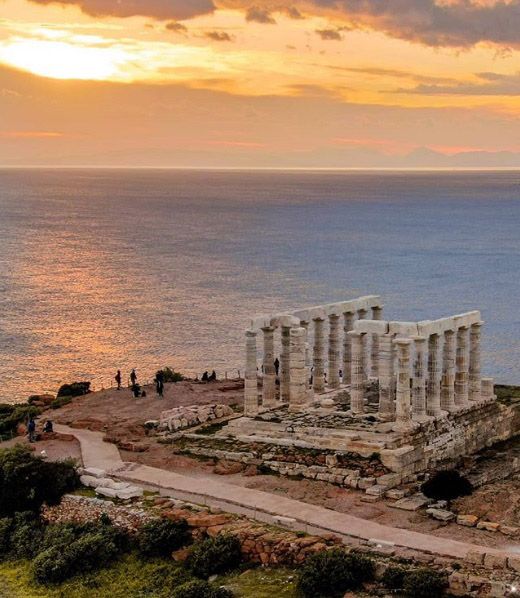 an aerial view of the acrobatic temple of poset one at sunset