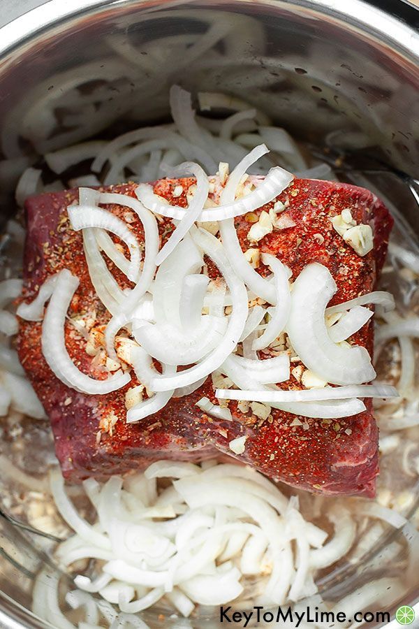 meat and onions are being cooked in the instant pressure cooker for an easy meal