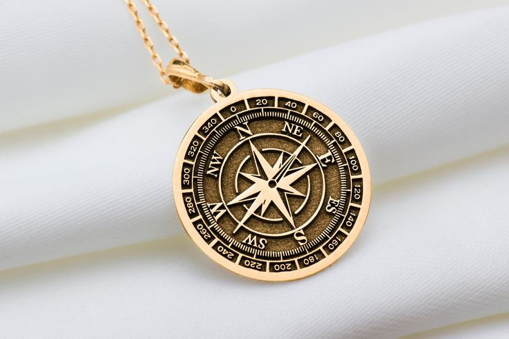 14K Solid Gold Compass Necklace, Scope Silver Charm Pendant, Personalized Compass Charm Gift, Dainty Gold Scope Charm Necklace  * Gender : Male / Female * Material : Solid Gold and 925 Sterling Silver  * The necklace size on the model in the photos is 22mm. * Gold plated and rose gold plated options are 14 carat and are made on silver. * The thickness of the silver and plated necklaces is 1 mm. * The thickness of the Solid Gold necklace is 0.8 mm * If you prefer a 14k solid gold with triple chai Bronze Compass Design Jewelry As Gift, Bronze Compass Design Jewelry For Gifts, Bronze Compass Design Jewelry Gift, Gold Compass Necklace, Compass Necklace, Solid Gold Necklace, Necklace Size, Charm Gift, Necklace Sizes