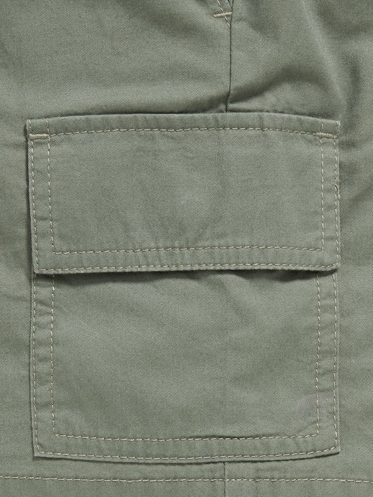 elasticized waistband functional drawstring faux fly diagonal on-seam pockets flap-cargo pockets easy pull-on style sits at waist relaxed through hip and thigh hits above kneemachine wash according to the care instruction label Cargo Joggers, Weimaraner, Jogger Shorts, Above Knee, Old Navy, Navy