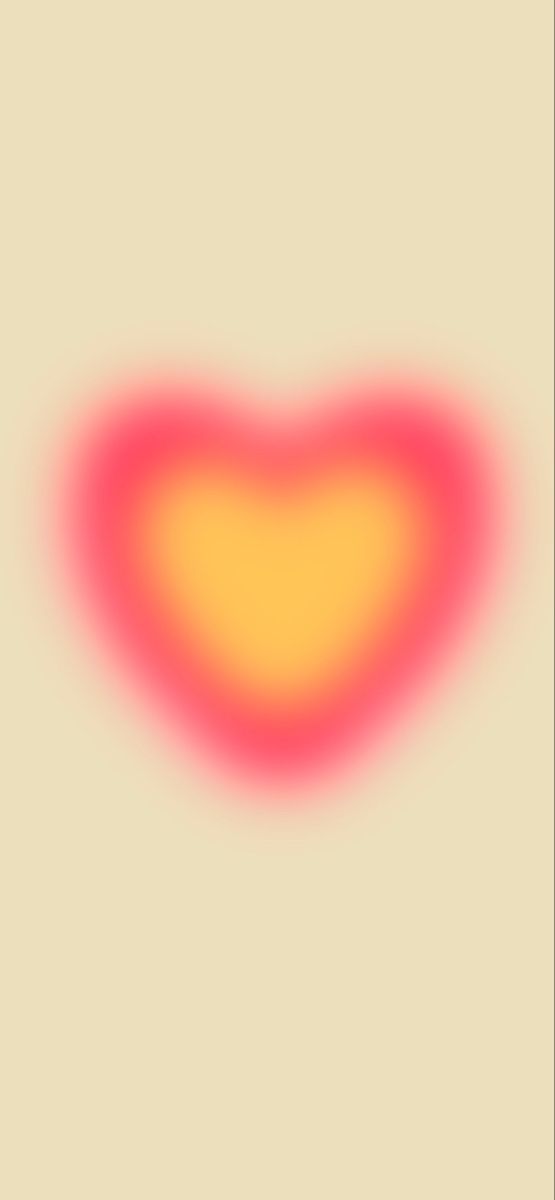 a red and yellow heart shaped object in the middle of a beige background with an orange center