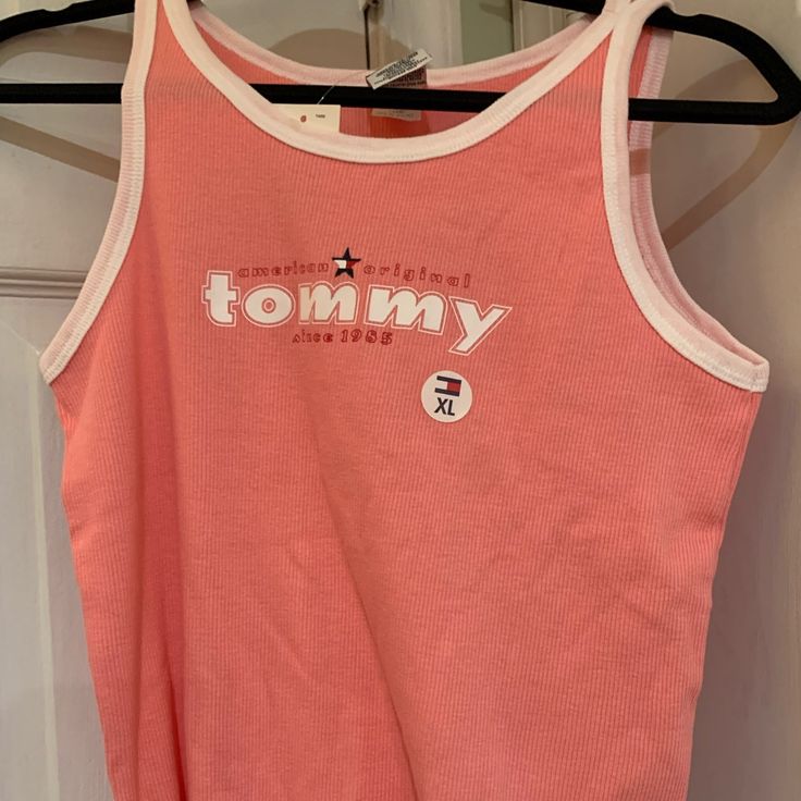 Nwt Tommy Hilfiger Girls Size Xl Coral Tank. Comes From A Pet And Smoke Free Home. Communication Through Poshmark Only. Retails $16.00 Pink Tank Top For Streetwear In Summer, Pink Tank Top For Summer Streetwear, 90s Style Letter Print Tank Top For Spring, 90s Style Tank Top With Letter Print For Spring, 90s Style Spring Tank Top With Letter Print, Pink Tank Top For Streetwear In Spring, Pink Tank Top For Spring Streetwear, Pink Sleeveless Top For Streetwear, Trendy Tommy Hilfiger Tops For Streetwear