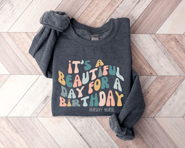 It's a Beautiful Day for a Birthday with our Nursery Nurse shirt! More specialties are available in our shop. Find this design on a TSHIRT: https://www.etsy.com/listing/1455253505/nursery-nurse-shirt-newborn-nursery?ref=listing_published_alert S I Z I N G: ----------------- These sizes are unisex. Please refer to the size chart prior to ordering. S H I P P I N G & R E TU R N S: ----------------------------------------- These products are made to order and ship out within 5 business days. Because of this, returns cannot be accepted. If your product was damaged during shipment, please contact me. Lost packages: We are not responsible for incorrect delivery addresses, or for packages lost in transit. Please double check to ensure all order/delivery information is entered correctly prior to ch Neonatal Nurse Practitioner, Nursery Nurse, Nurse Birthday, Neonatal Nurse, Newborn Nursery, Nursing Student Gifts, Nursing Baby, Future Nurse, Retro Sweatshirts