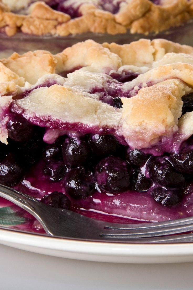 a close up of a pie on a plate