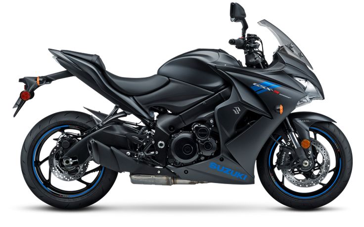 a black and blue motorcycle is shown on a white background with the words suzuki written below it