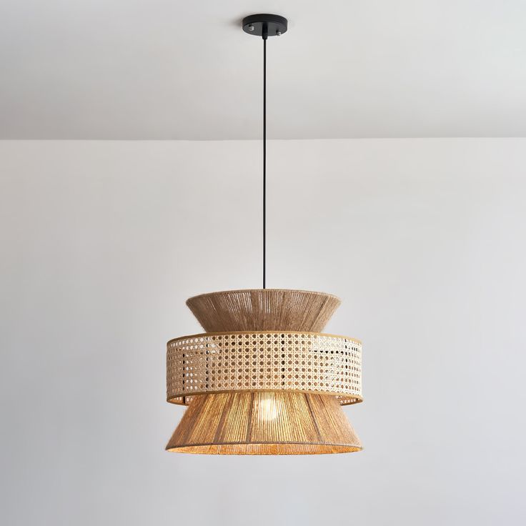 a wooden light fixture hanging from the ceiling