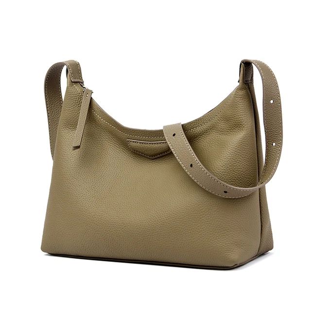 100% cowhide Large capacity Shoulder Bag Large Capacity Leather Pouch Shoulder Bag, Leather Pouch Shoulder Bag With Large Capacity, Luxury Leather Khaki Bags, Luxury Khaki Leather Bag, Large Capacity Leather Shoulder Bag In Khaki, Khaki Leather Shoulder Bag With Large Capacity, Khaki Leather Shoulder Bag Large Capacity, Travel Bucket Bag In Beige With Smooth Grain, Solid Color Tote Shoulder Bag With Smooth Grain