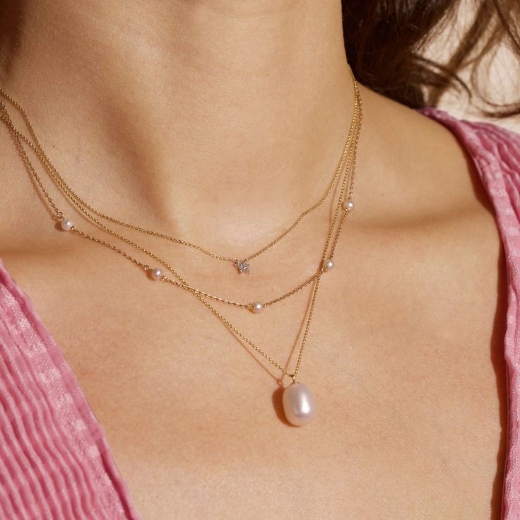 We’re picky about our pearls. Our collection of modern-feel pearl pieces takes your grandmother's favorites and incorporates them into the latest trends, interpreted from our NYC-gal perspective. These gem-quality pearls are freshwater cultured beauties, set in solid gold that won't tarnish or flake. We may have expensive taste, but crazy mark-ups aren’t really our thing. So we balance the best quality and the best price — enough said. 14k Solid yellow gold 9mm x 7mm Oval-shaped freshwater cultu Simple Gold Choker Necklace, Expensive Taste, Necklace Extender, Pearl Choker Necklace, Gold Choker Necklace, Expensive Jewelry, Gold Choker, Gold Necklace Layered, Stone Pendant Necklace