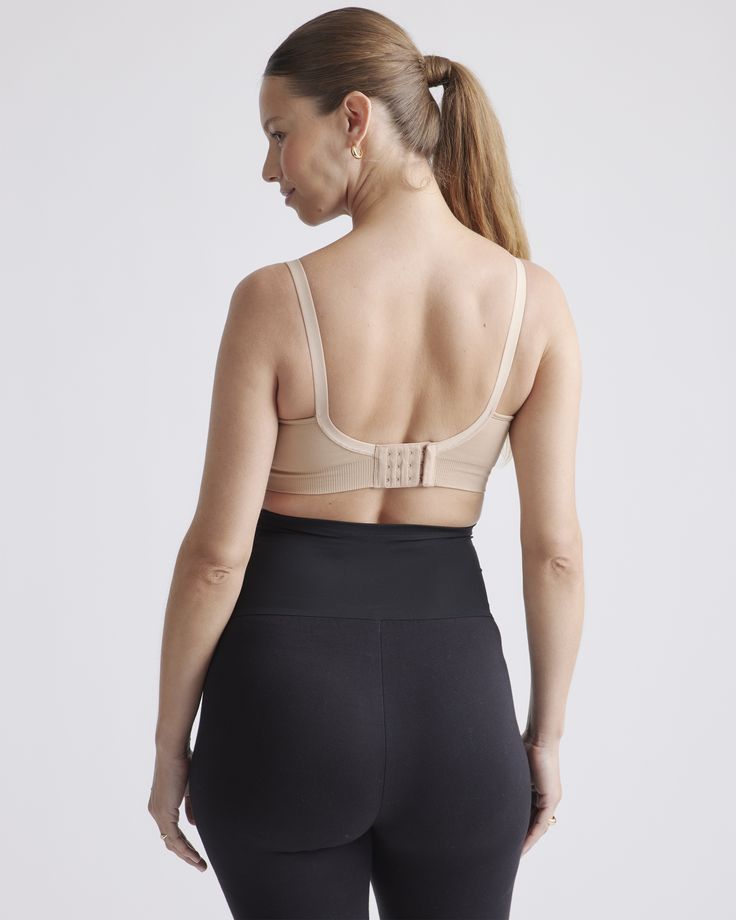 Why yes, it is possible to love your nursing bra this much. Made with a blend of recycled nylon and spandex, the seamless bra includes knit-in support zones around the cups to provide lift without a single wire. Designed with adjustable straps and a bra extender to keep you comfortable throughout pregnancy and postpartum. It also comes with all the nursing essentials like removable pads and clips. The perfect everyday bra, providing you with the full coverage support you need.  | Quince | Women' Compressive Full Coverage Sports Bra With Built-in Bra, Supportive Stretch Nursing Bra With Built-in Bra, Supportive Full Coverage Nursing Bra With Medium Bust Support, Seamless Stretch Nursing Bra With Full Coverage, Supportive Fitted Seamless Nursing Bra, Seamless Stretch Nursing Bra Full Coverage, Stretch Nursing Bra With Removable Pads And Full Coverage, Supportive Nursing Bra With Medium Bust Support, Stretch Nursing Bra With Removable Pads