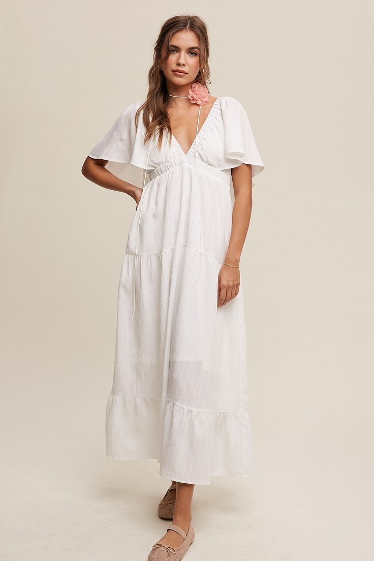 - V-neck ruffle sleeve flowy maxi dress - V-neck with elastic - Adjustable tie string on back - Tiered skirt - Hidden side seam pockets - Finished with clean hem - Lined Vacation Dress, Flowy Maxi Dress, Tiered Midi Dress, Sleeve Maxi Dress, Flutter Sleeve Dress, Vacation Dresses, Glam Dresses, Neck Ruffle, Tier Skirt