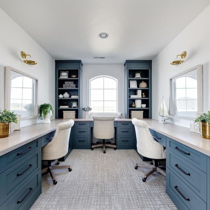 an office with blue cabinets and white desks