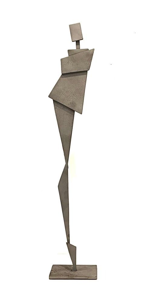 an abstract metal sculpture on a white background