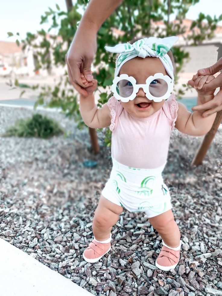 The Sun is out and the beach is calling! Our flower petal sunglasses are the perfect mix of fun and play. Take out the camera and get ready for sunny cuteness! These are perfect gifts for the spring and summertime! Each pair of sunglasses has flower shaped frames, plastic lens, and they are easy for baby and toddler to hold. The fun baby sunglasses come in their personal protective bag and a cleaning cloth as shown on third photo. Available in 8 different colors. View our entire collection by cl White Fun Sunglasses For Summer, Fun White Sunglasses For Summer, White Fun Sunglasses For Spring, Fun White Sunglasses For Spring, White Sunglasses For Summer Beach, Spring Beach Sunglasses, White Summer Beach Sunglasses, Playful Polarized Sunglasses For Spring, Playful Summer Sunglasses With Mirrored Lenses