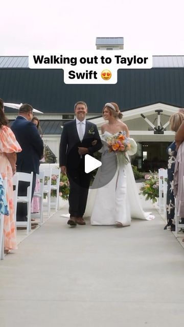 a bride and groom walking down the aisle