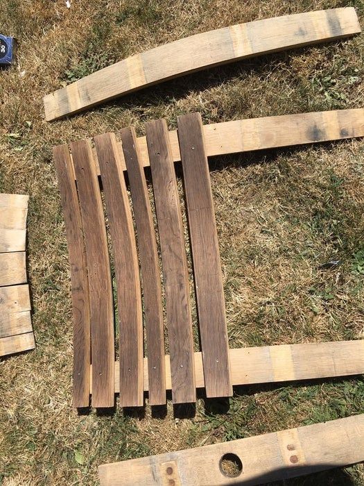 several pieces of wood laying on the ground