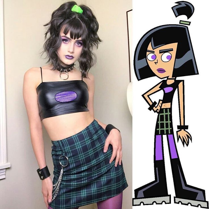 a woman with black hair and purple makeup standing next to a cartoon character