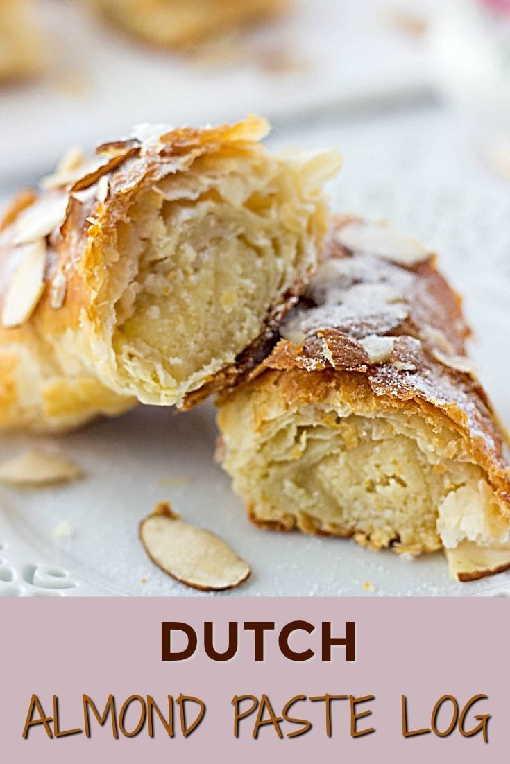 a close up of a pastry on a plate with the words dutch almond paste log