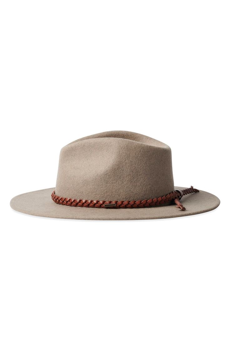 Pure wool felt elevates a Western-inspired fedora with timeless appeal. 100% wool Spot clean Imported Wool Fedora With Short Brim For Fall, Fall Wool Fedora With Short Brim, Fall Wool Fedora With Curved Brim, Fall Wool Beige Fedora, Beige Wool Felt Hat For Fall, Fall Beige Wool Fedora, Wool Flat Brim Fedora For Spring, Spring Wool Fedora Felt Hat, Winter Wool Beige Hat Band