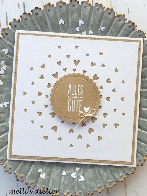 a close up of a greeting card on a paper doily with hearts and the words, all's gott