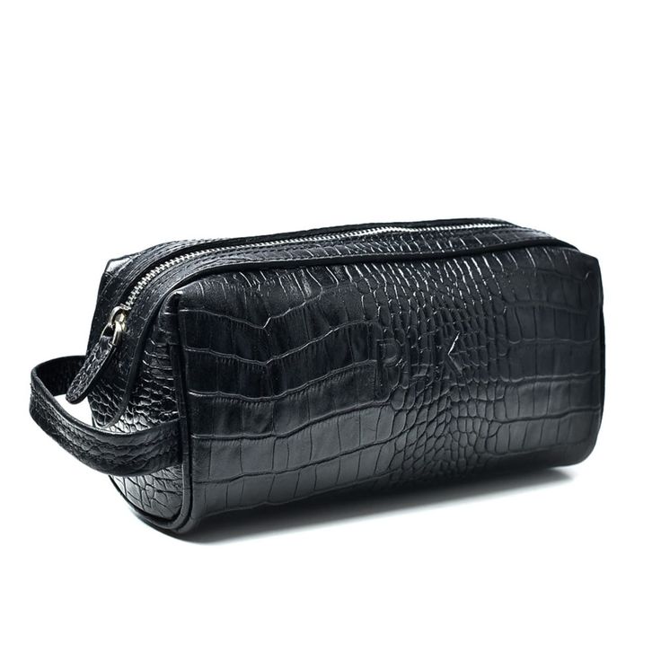 This stylish unisex cosmetic bag for your everyday essentials is a classy detail with a sense of final designer touch.Suitable gift for ladies and gentlemen with attitude to detail.The sensuality of leather texture and the classic form gives this accessory the familiar character of the PLIK brand. Crafted in EU out of the finest Italian leather100% genuine leatherTextile liningStamped PLIK logoInternal zip pocket Elegant Cosmetic Bag With Zipper For Daily Use, Luxury Rectangular Cosmetic Bag With Removable Pouch, Luxury Rectangular Cosmetic Bag For Formal Use, Luxury Rectangular Cosmetic Bag For Formal Occasions, Luxury Formal Rectangular Cosmetic Bag, Elegant Leather Cosmetic Bag For Business, Elegant Leather Travel Cosmetic Bag, Elegant Travel Cosmetic Bag With Zipper, Luxury Black Rectangular Cosmetic Bag