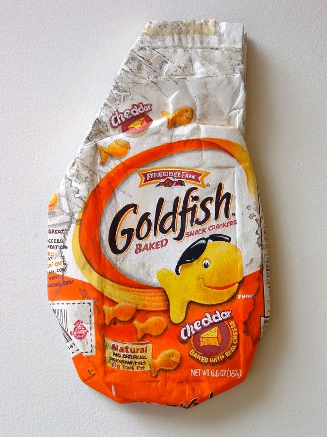 a bag of goldfish baked snack sitting on top of a white wall