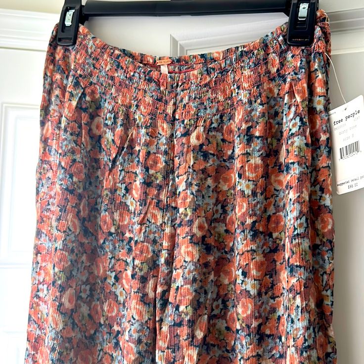 “Dusty Rose” Floral Pants By Free People. Large Flare At Bottom. Could Be High Waisted Depending On Your Body Type. Lightweight, Stretch Elastic At Top.. Super Comfy! And Never Worn! Would Be Perfect For A Coachella Type Vibe Pink Summer Bottoms In Rayon, Pink Rayon Bottoms For Summer, Multicolor Rayon Bottoms With Elastic Waistband, Multicolor Elastic Waistband Rayon Bottoms, Non-stretch Floral Print Bottoms For Loungewear, Multicolor Bottoms For Spring Daywear, Casual Floral Print Pants For Daywear, Casual Multicolor Rayon Bottoms, Casual Floral Print Pants