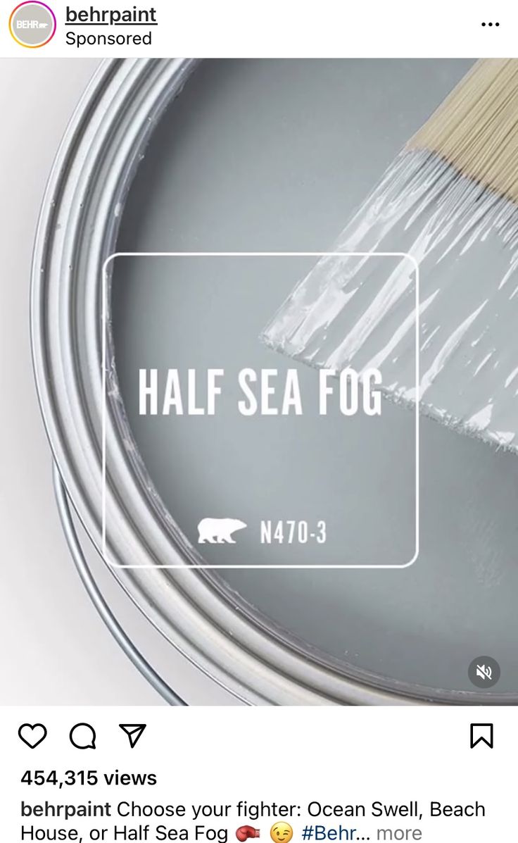 a paint can with the words half sea fog painted on it and a brush inside