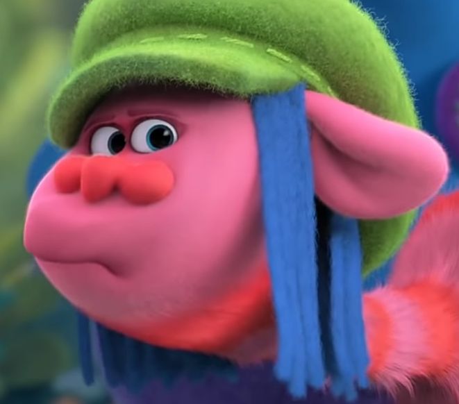 an animated character wearing a green hat and blue hair