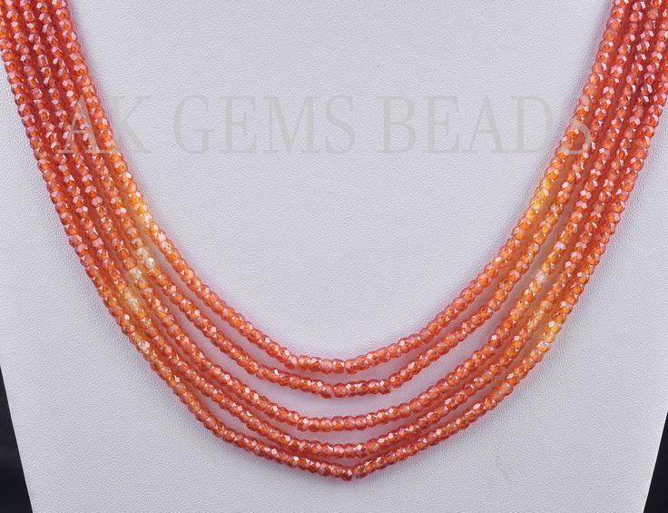 PRODUCT DETAILS: AAA Orange Shaded Cubic Zirconia 5 Strand Faceted Rondelle Beaded Necklace Jewelry Stone Name :- Cubic Zirconia ( Light Orange and Dark Orange ) Bead Size :- 3mm Length :- 13 to 15 Inches Bead Shape :- Rondelle Bead Type :- Faceted Quality :- AAA (Excellent) Treatment :- Natural 2. NECKLACE LENGTHS :- 1st Strands :- 13 Inches 2nd Strands :- 13.5 Inches 3rd Strands :- 14 Inches 4th Strands :- 14.5 inches 5th Strands :- 15 inches More Fine Shop Gemstones Gemstone Cubic Zirconia Ne Necklace Orange, Gemstone Beads Wholesale, 2 Necklace, Orange Necklace, Semi Precious Jewelry, Gemstone Beaded Necklace, Wear Necklaces, Jewelry Stone, Dark Orange