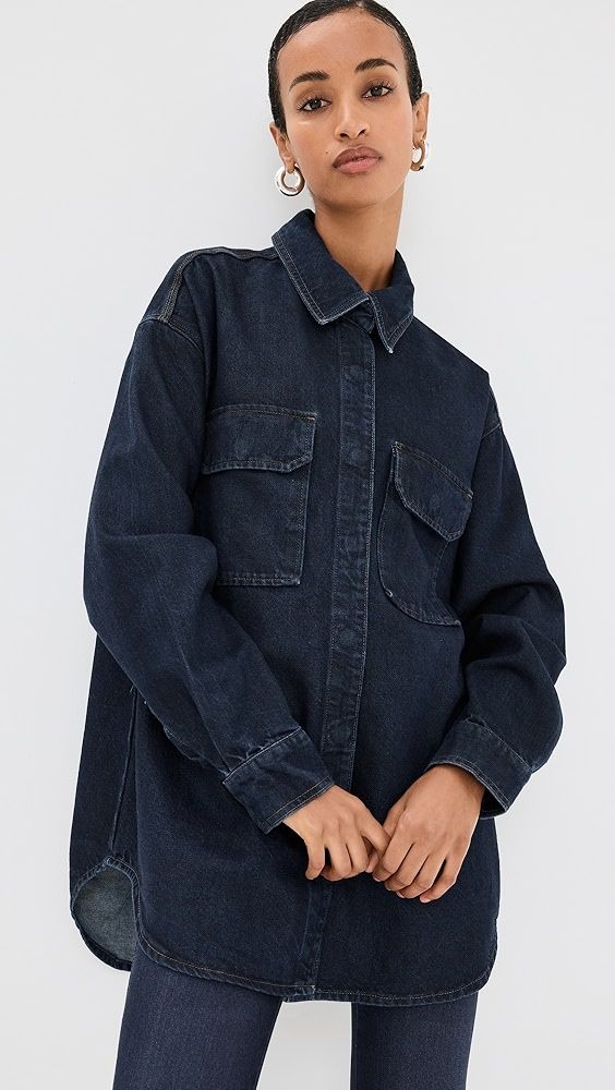 Good American Oversized Shirt | Shopbop Fall Denim Blue Top With Button Cuffs, Dark Wash Cotton Denim Top With Buttoned Pockets, Medium Wash Denim Top With Buttoned Pockets, Denim Tops With Flap Pockets And Relaxed Fit, Relaxed Fit Denim Tops With Flap Pockets, Dark Wash Denim Top With Buttoned Pockets, Dark Wash Long Sleeve Denim Top With Buttoned Pockets, Denim Shacket With Buttoned Pockets, Button-up Denim Top With Button Cuffs For Fall