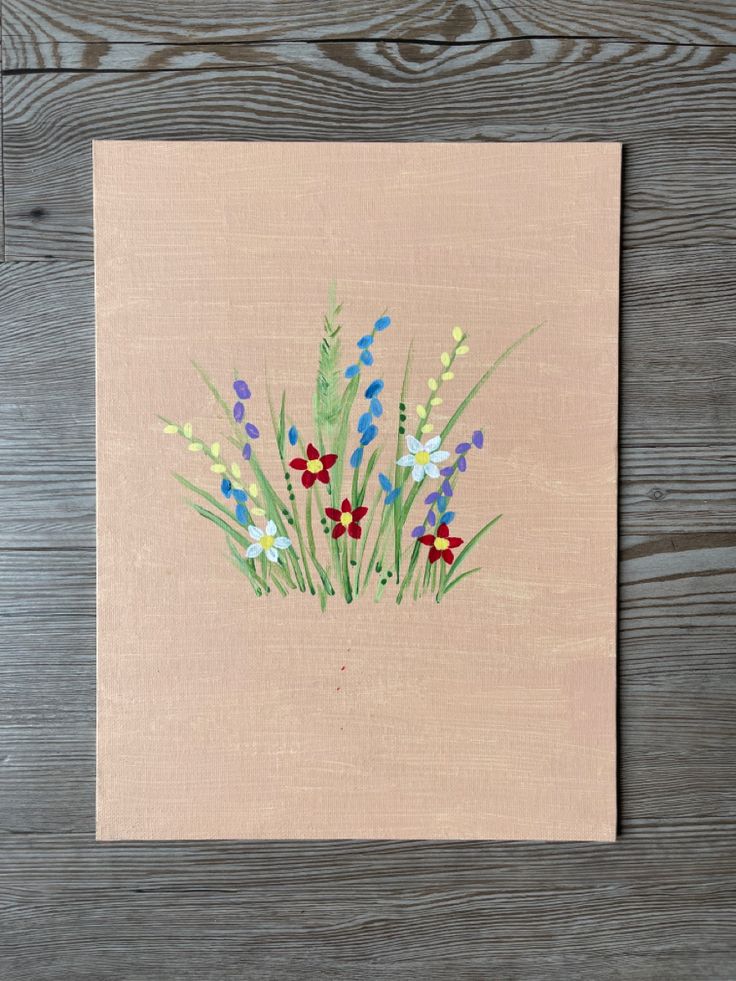 an image of flowers painted on a piece of paper