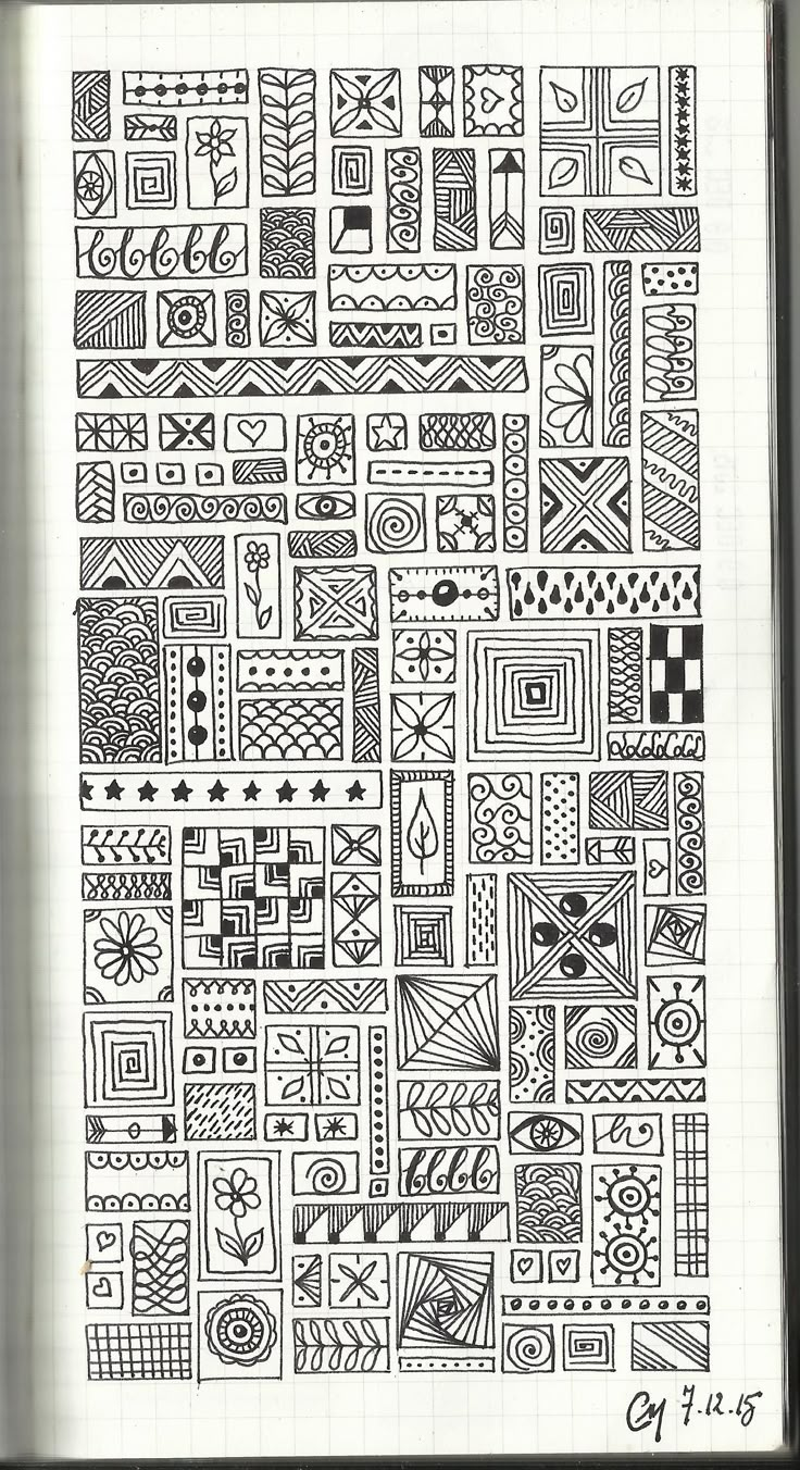 a notebook with doodled designs on it