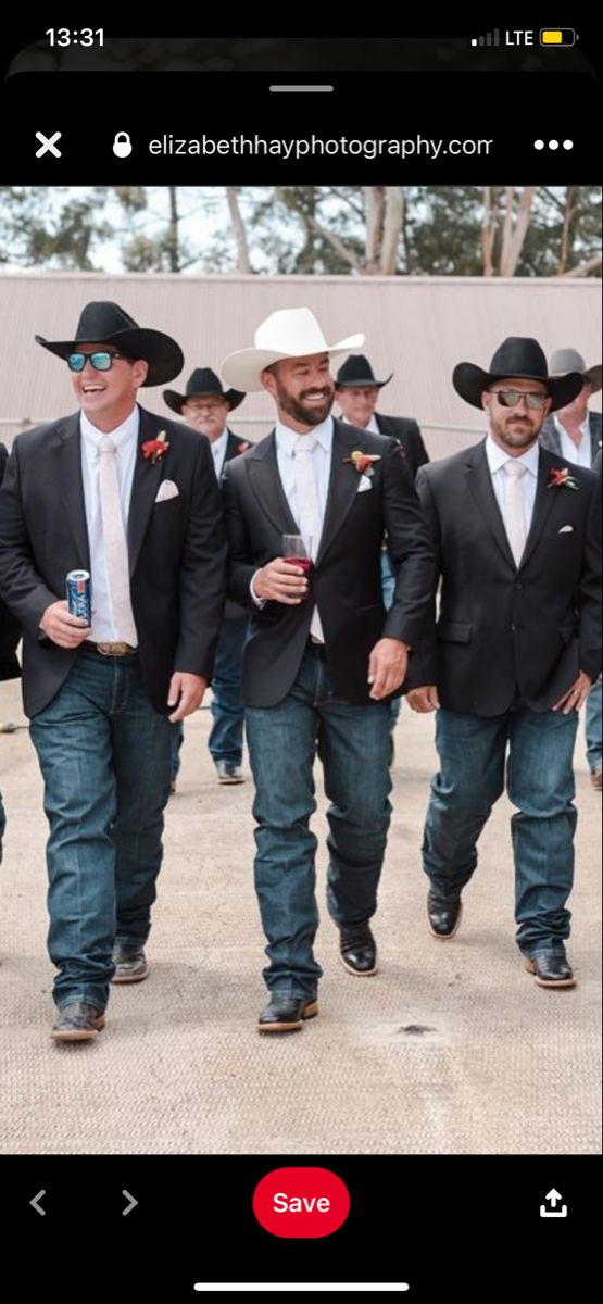 a group of men in suits and hats walking together