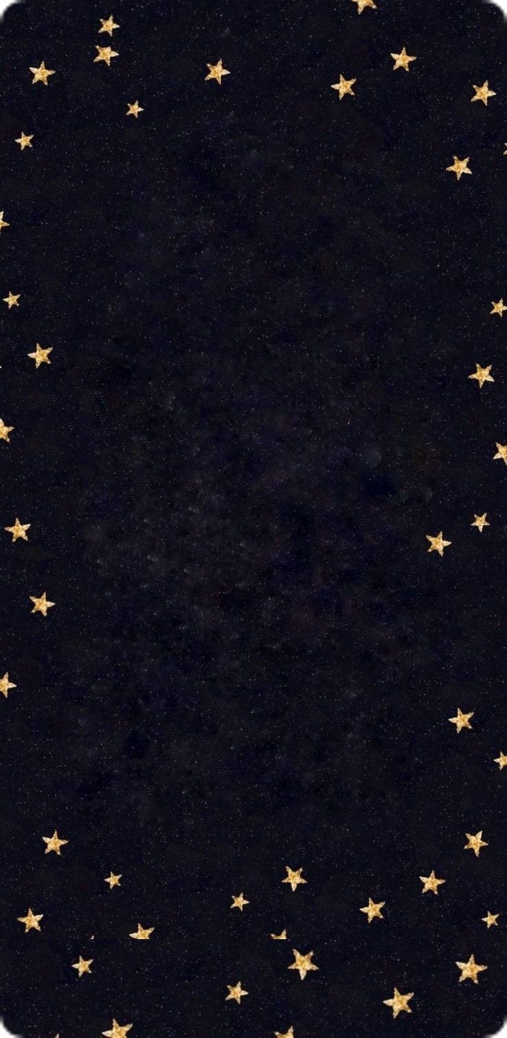 a black background with gold stars on it