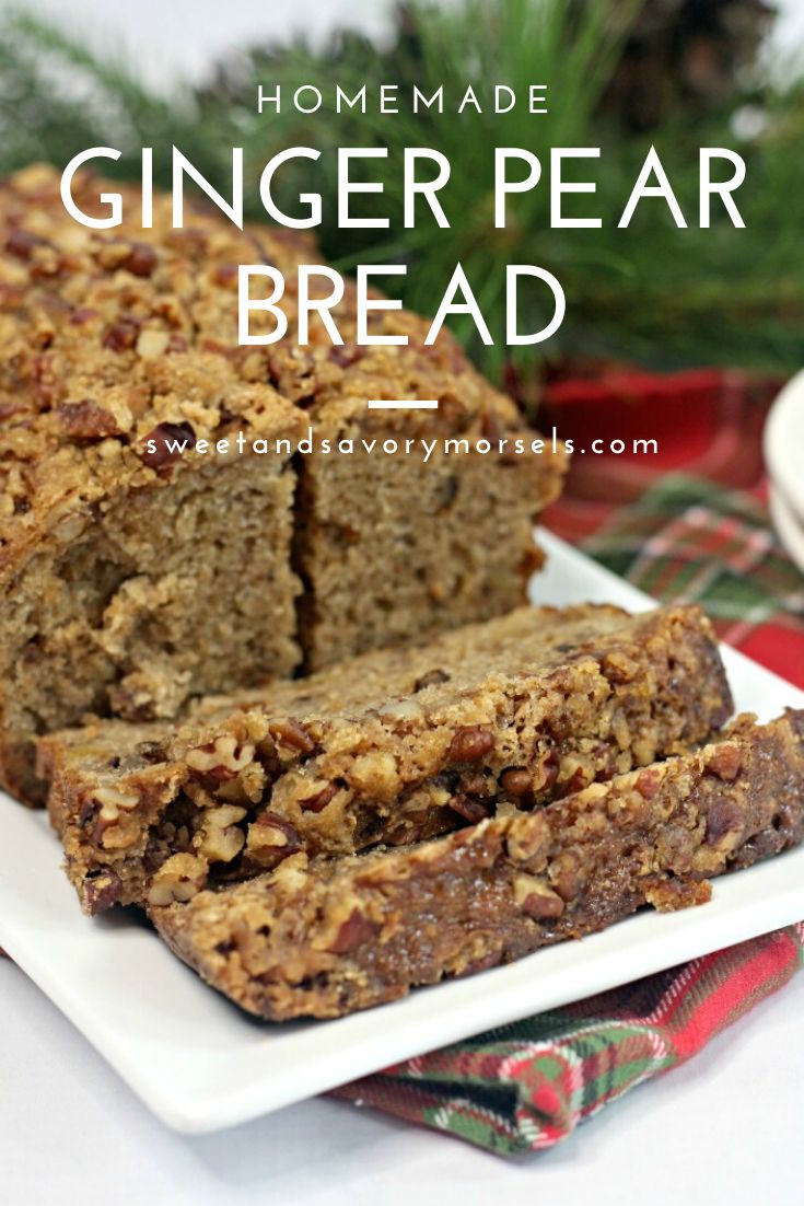 homemade ginger pear bread on a white plate with a plaid table cloth and pine branches in the background