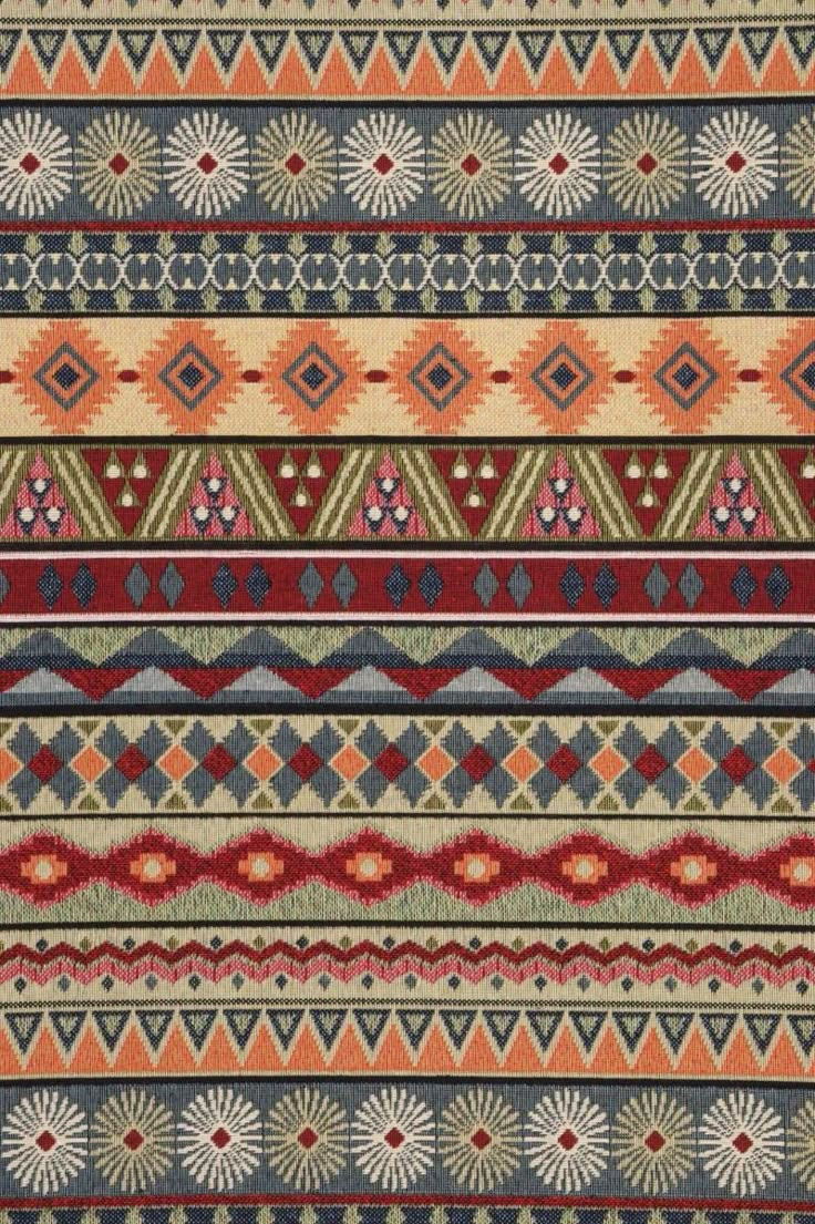 a multicolored rug with different patterns on it