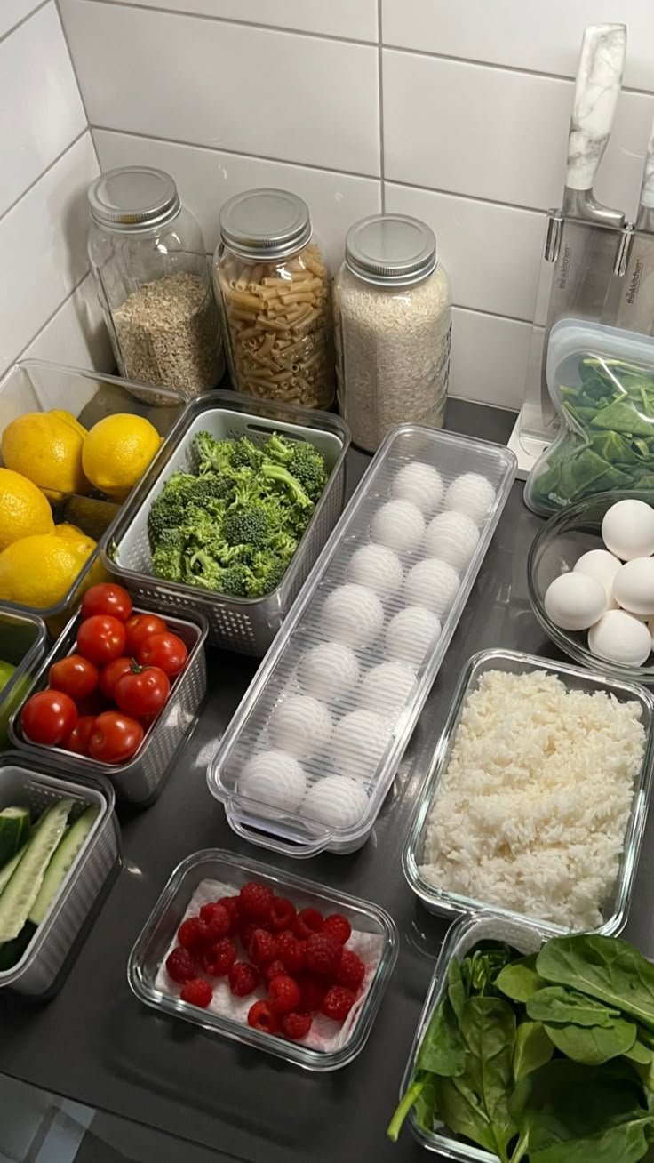 an assortment of food is displayed on the counter