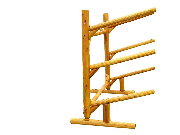 a wooden rack with three bars attached to the top and bottom of it, against a white background