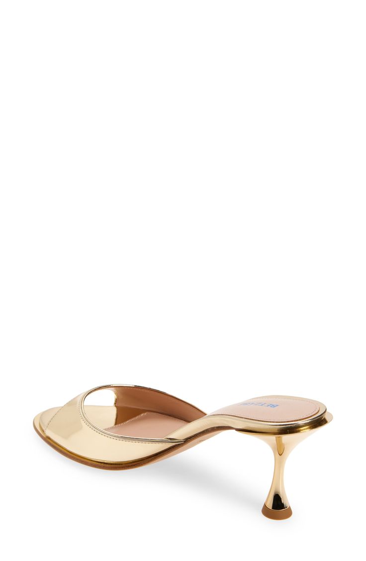 A pedestal heel juts from the back to bring brand-signature shape to this mirror-finish sandal. 2 1/2" (65mm) heel Leather upper, lining and sole Made in Italy Designer Shoes Hispanic & Latinx Owned/Founded Elegant Mules With Reinforced Heel And Single Toe Strap, Cocktail Sandals With Sculpted Heel And Closed Toe, Evening Patent Leather Sandals With Almond Toe, Evening Sandals With Almond Toe In Patent Leather, Evening Sandals With Deep Heel Cup In Patent Leather, Cocktail Sandals With Sculpted Heel In Patent Leather, Gold Sandals With Sculpted Heel And Almond Toe, Evening Almond Toe Patent Leather Sandals, Designer Summer Party Kitten Heels