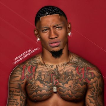 a man with tattoos and piercings on his chest is posing for a photo in front of a red background