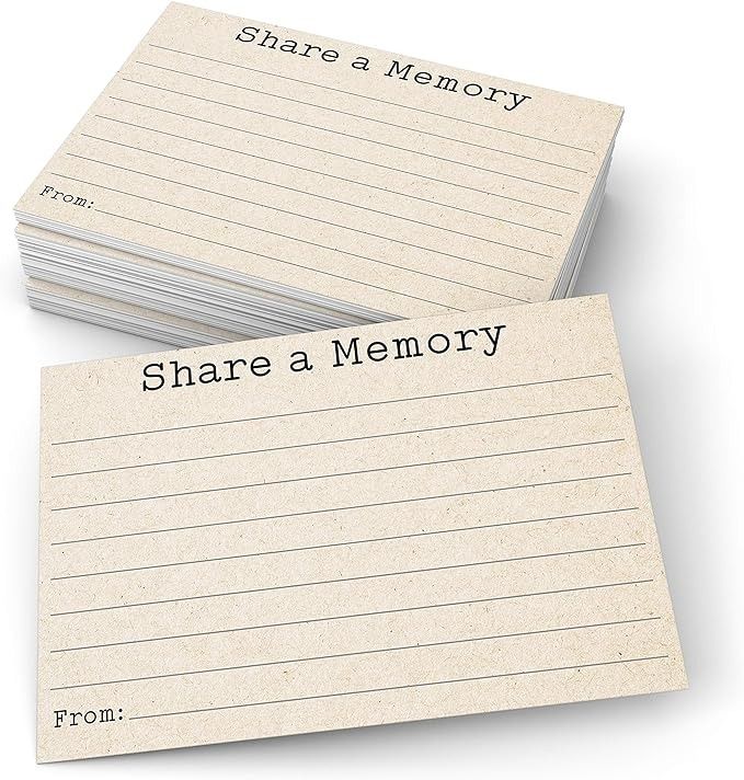 two notepads with the words share a memory written on them