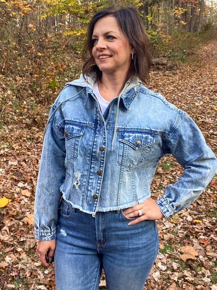 Be cute, comfy, stylish, and on trend with this cropped hoodie jean jacket. This jacket features a zip and snap closure, a sweatshirt material hoodie, fringe bottom, two front chest pockets, and some distressing. You're going to love wearing this all year long. Great for all seasons. True to size. I am wearing the small. Sizes: Small-Large Jean Jacket Hoodie, Cute Comfy, Cropped Hoodie, Chest Pocket, All Seasons, Jean Jacket, Snap Closure, Denim Jacket, Sweatshirts