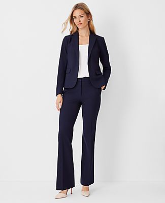 Elevate your wardrobe with the Ann Taylor High Rise Trouser Pant in Seasonless Stretch, a perfect blend of style and comfort. These trousers are designed to flatter with a high-rise waist that sits just below the natural waistline, and a tailored fit that streamlines your silhouette. The slight flare at the leg opening adds a touch of elegance, making these pants ideal for both office and evening wear.

- **Size:** Regular - 4
- **Color:** Deep Navy Sky
- **Material:** 68% Polyester, 29% Viscose Fitted Wide Leg Career Bottoms, Spring Business Pants In Elastane, Spring Business Elastane Pants, Spring Business Pants Made Of Elastane, Chic Career Pants For Fall, Fall Slim Fit Office Pants, Slim Fit Office Pants For Fall, Tailored Career Pants With Welt Pockets, Professional Fitted Solid Color Pantsuit