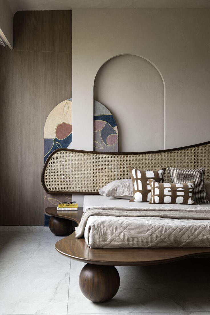 a bed sitting on top of a wooden table