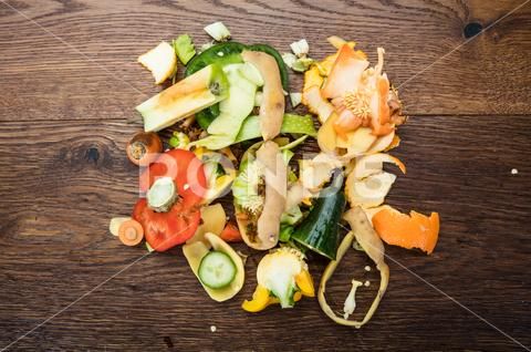 a pile of chopped vegetables on top of a wooden table stock photos, pictures and images